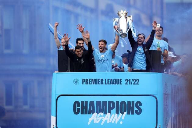 Mandatory Credit: Photo by Paul Greenwood Shutterstock (12952148q) Manchester City players Oleksandr Zinchenko, Ilkay Gundogan, Rodri, Ruben Diasho and Bernardo Silva with the Premier League trophy during the bus parade through Manchester City centre to celebrate winning the Premier League Manchester City Trophy Parade, Premier League, Football, Manchester, UK - 23 May 2022 EDITORIAL USE ONLY No use with unauthorised audio, video, data, fixture lists, club league logos or live services. Online in-match use limited to 120 images, no video emulation. No use in betting, games or single club league player publications. Manchester City Trophy Parade, Premier League, Football, Manchester, UK - 23 May 2022 EDITORIAL USE ONLY No use with unauthorised audio, video, data, fixture lists, club league logos or live services. Online in-match use limited to 120 images, no video emulation. No use in betting, games or single club league player publications. Copyright: xPaulxGreenwood Shutterstockx 12952148q