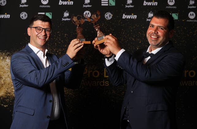 Wim Beelaert and Van de Merlen Valy pose for the photographer with the Community and football Awards trophy during the Pro League Awards 2022, for the best players in the first (1A) and second (1B) divisions of the Belgian soccer championships, Monday 23 May 2022 in Brussels. VIRGINIExLEFOUR  x35427201x