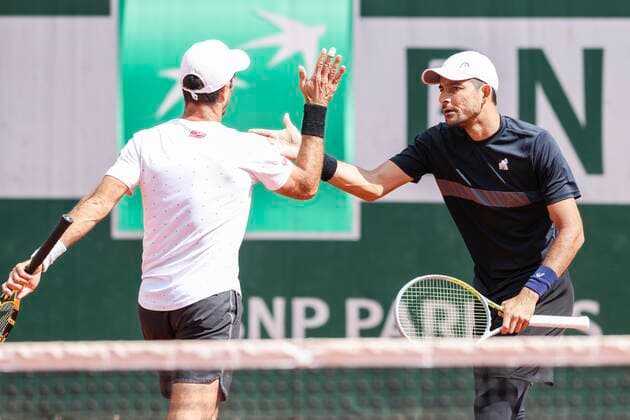 TENNIS - French Open 2022 PARIS,FRANCE,24.MAY.22 - TENNIS - ATP, Tennis Herren World Tour, French Open, Roland Garros, Grand Slam. Image shows the rejoicing of Jean-Julien Rojer (NED) and Marcelo Arevalo (ESA).  GEPAxpictures xPatrickxSteiner