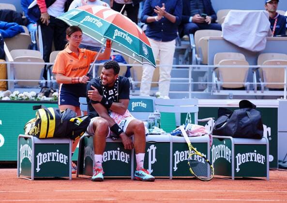 Mandatory Credit: Photo by Javier Garcia Shutterstock (12954043dd) Jo Wilfried Tsonga rubs his shoulder during his last ever match before retiring French Open Tennis, Day 3, Roland Garros, Paris, France - 24 May 2022 French Open Tennis, Day 3, Roland Garros, Paris, France - 24 May 2022  Copyright: xJavierxGarcia Shutterstockx 12954043dd