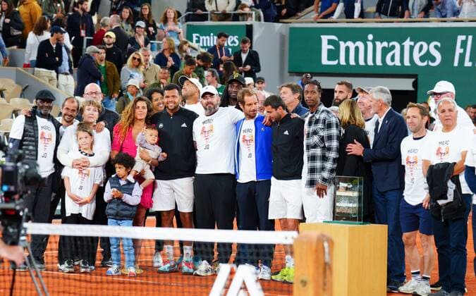 Mandatory Credit: Photo by Javier Garcia Shutterstock (12954043di) Jo Wilfried Tsonga poses for photos after his last ever match with players, family and former coaches French Open Tennis, Day 3, Roland Garros, Paris, France - 24 May 2022 French Open Tennis, Day 3, Roland Garros, Paris, France - 24 May 2022  Copyright: xJavierxGarcia Shutterstockx 12954043di