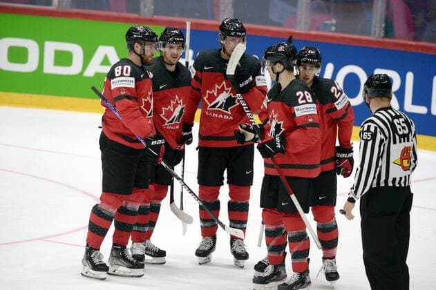 Players of Team Canada celebrate their game opening goal by Dylan Cozens (R) during the 2022 IIHF Ice hockey, Eishockey World Championships preliminary round group A match between Canada and France in Helsinki on May 24, 2022. Helsinki Finland LKFTVX20220524204932GKTO  Copyright: xMikkoxStigx