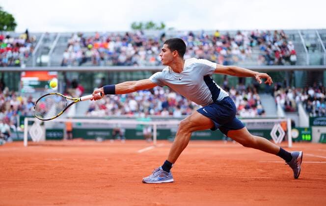 Mandatory Credit: Photo by Javier Garcia Shutterstock (12954376ak) Carlos Alcaraz in second round action French Open Tennis, Day 4, Roland Garros, Paris, France - 25 May 2022 French Open Tennis, Day 4, Roland Garros, Paris, France - 25 May 2022  Copyright: xJavierxGarcia Shutterstockx 12954376ak