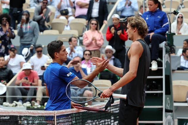 German Alexander Zverev (R) and Sebastian Baez of Argentine shake hands at the end of their French Tennis Open match at Roland Garros near Paris, France, on Wednesday 25 May, 2022. Zverev won 2-6, 4-6, 6-1, 6-2, 7-5.  PAR20220525156 MAYAxVIDON-WHITE