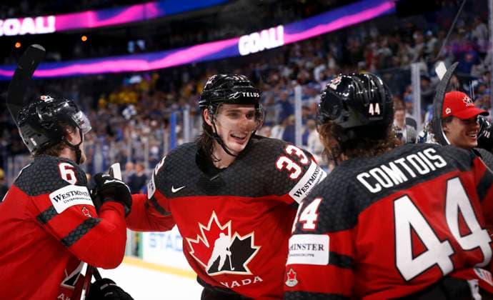Sport Bilder des Tages Travis Sanheim 6, Ryan Graves 33, CAN and Maxime Comtois 44, CAN celebrating overtime goal during the 2022 IIHF Ice hockey, Eishockey World Championship, WM, Weltmeisterschaft match between Sweden - Canada at the Nokia Arena on 26. May 2022 in Tampere, Finland. (Kalle Parkkinen Newspix24)  Copyright: xKallexParkkinenx np2426550001888