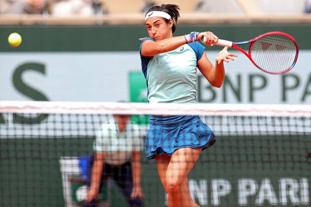 26th May 2022; Roland Garros, Paris, France: French Open Tennis tournament: Caroline Garcia (FRA) powers a forehand return  ActionPlus12393087 JonxBromley