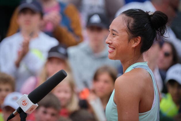 (220527) -- PARIS, May 27, 2022 -- Zheng Qinwen reacts during an interview after the women s singles second round match between Zheng Qinwen of China and Simona Halep of Romania at the French Open tennis tournament at Roland Garros in Paris, France, on May 26, 2022. ) (SP)FRANCE-PARIS-TENNIS-ROLAND GARROS-FRENCH OPEN MengxDingbo 