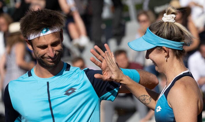 Belgian Sander Gille and Australian Storm Sanders pictured during a tennis match versus Russian Dzalamidze and Kazakh Bublik, in the first round of the mixed doubles at the Roland Garros French Open tennis tournament, in Paris, France, Friday 27 May 2022. This year s tournament takes place from 22 May to 5 June. BENOITxDOPPAGNE  x35559490x