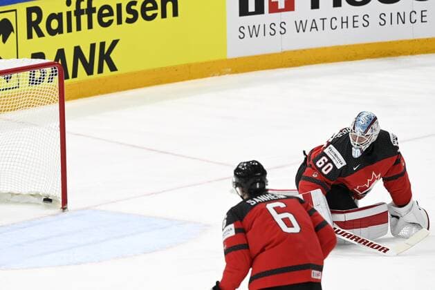 David Krejci (not in the picture) of Czech Republic scores 0-1 goal past goalkeeper Chris Driedger and Travis Sanheim of Canada during the 2022 IIHF Ice hockey, Eishockey World Championships semi-final match between Canada and Czech Republic in Tampere on May 28th, 2022 Tampere Finland LKFTJK20220528183537QFAE  Copyright: xEmmixKorhonenx