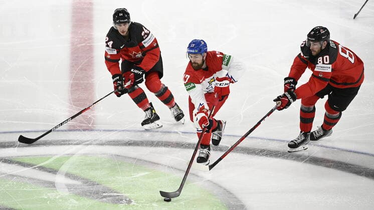 From left Dylan Cozens of Canada, Czech Filip Hronek, Pierre-Luc Dubois of Canada in action during the 2022 IIHF Ice hockey, Eishockey World Championship, WM, Weltmeisterschaft semifinals match Czech Republic vs. Canada, Tampere, Finland, May 28, 2022. (CTKxPhoto MichalxKamaryt) CTKPhotoP2022052803868 