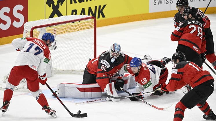 From left Czech Filip Hronek, Chris Driedger goalie of Canada, Czech Tomas Hertl in action during the 2022 IIHF Ice hockey, Eishockey World Championship, WM, Weltmeisterschaft semifinals match Czech Republic vs. Canada, Tampere, Finland, May 28, 2022. (CTKxPhoto MichalxKamaryt) CTKPhotoP2022052804067 