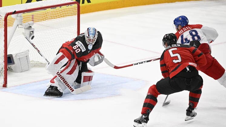 From left goalie of Canada Chris Driedger, Nick Holden of Canada and Czech Tomas Hertl in action during the 2022 IIHF Ice hockey, Eishockey World Championship, WM, Weltmeisterschaft semifinals match Czech Republic vs. Canada, Tampere, Finland, May 28, 2022. (CTKxPhoto MichalxKamaryt) CTKPhotoP2022052804142 