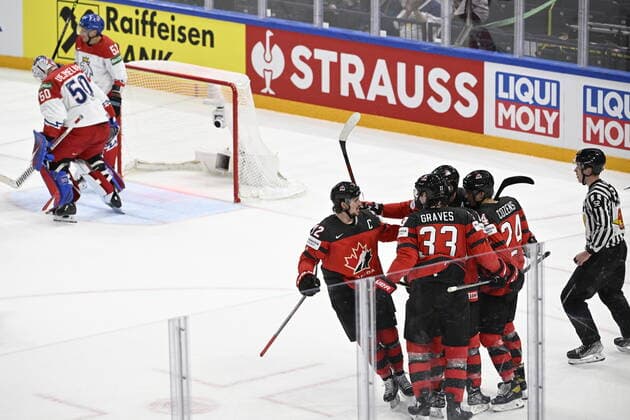Czech goalie Karel Vejmelka (left) receives a goal, hockey players of Canada celebrate during the 2022 IIHF Ice hockey, Eishockey World Championship, WM, Weltmeisterschaft semifinals match Czech Republic vs. Canada, Tampere, Finland, May 28, 2022. (CTKxPhoto MichalxKamaryt) CTKPhotoP2022052804186 