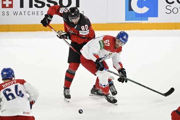 From left Pierre-Luc Dubois of Canada and Czech Jiri Smejkal in action during the 2022 IIHF Ice hockey, Eishockey World Championship, WM, Weltmeisterschaft semifinals match Czech Republic vs. Canada, Tampere, Finland, May 28, 2022. (CTKxPhoto MichalxKamaryt) CTKPhotoP2022052804226 