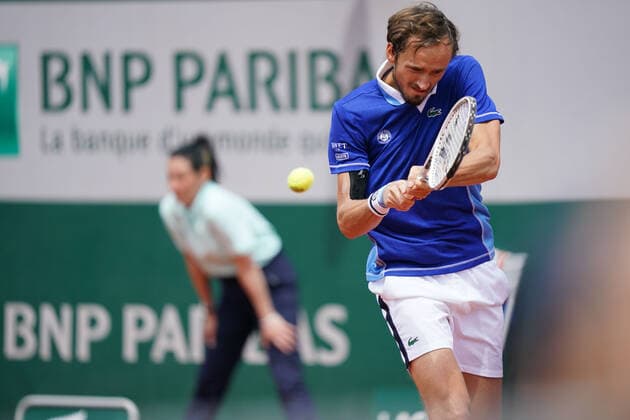 May 28, 2022, PARIS, France: DANIIL MEDVEDEV of Russia return the ball to MIOMIR KECMANOVIC of Serbia during the Day 7 of the French Open 2022, Grand Slam tennis tournament at the Roland Garros Stadium - Paris France..Daniil Medvedev won : 6:2 6:4 6:2 PARIS France - ZUMAp119 20220528_zaf_p119_149 Copyright: xPierrexSteveninx
