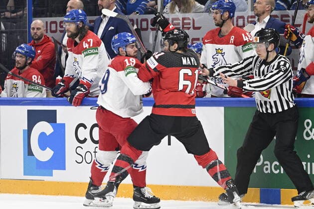 From left Czech Jakub Flek and Dysin Mayo of Canada in action during the 2022 IIHF Ice hockey, Eishockey World Championship, WM, Weltmeisterschaft semifinals match Czech Republic vs. Canada, Tampere, Finland, May 28, 2022. (CTKxPhoto MichalxKamaryt) CTKPhotoP2022052804428 