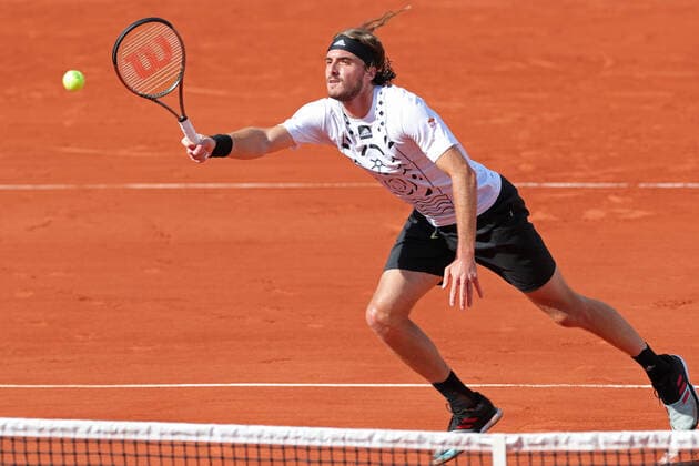 28th May 2022; Roland Garros, Paris, France: French Open Tennis tournament: Stefano Tsitsipas (GRE) in action at the net against Mikael Ymer (SWE)  ActionPlus12393929 JonxBromley