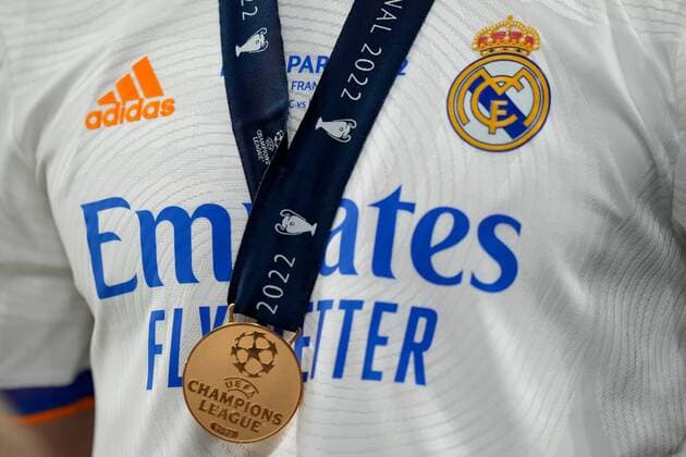 Mandatory Credit: Photo by Dave Shopland Shutterstock (12959891cm) Detail of the UEFA Champions League Winners Medal and Real Madrid home shirt Liverpool v Real Madrid, UEFA Champions League Final, Football, Stade de France, Saint-Denis Paris, France - 28 May 2022 Editorial use only Liverpool v Real Madrid, UEFA Champions League Final, Football, Stade de France, Saint-Denis Paris, France - 28 May 2022 Editorial use only Copyright: xDavexShopland Shutterstockx 12959891cm