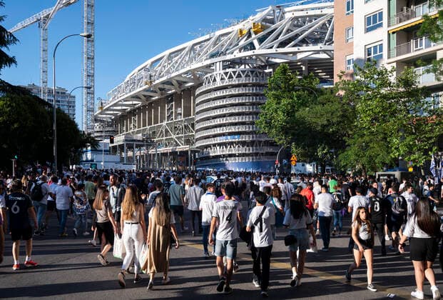 May 29, 2022, Madrid, Spain: Real Madrid fans arrive at the Santiago Bernabeu stadium to watch live on large screens the 2022 UEFA Champions League final match between Liverpool and Real Madrid in Madrid. Real Madrid won its 14th championship after beating Liverpool 1-0 at the Stade de France in Saint-Denis stadium in France. Madrid Spain - ZUMAs197 20220529_zaa_s197_005 Copyright: xMiguelxCandelax