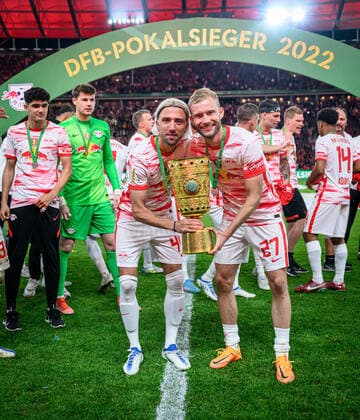 Leipzigs Kevin Kampl and Konrad Laimer pose with trophy DFB Pokalfinale 2022 SC Freiburg RB Leipzig 21 May 2022 Olympiastadion, Berlin SC Freiburg RB Leipzig