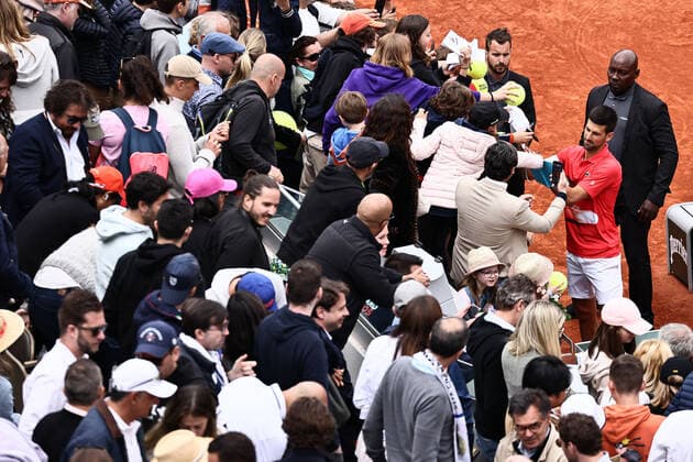 Novak Djokovic, SRB, signing autographs after fourth round of 2022 French Open at Roland Garros, Paris, 29 05 2022