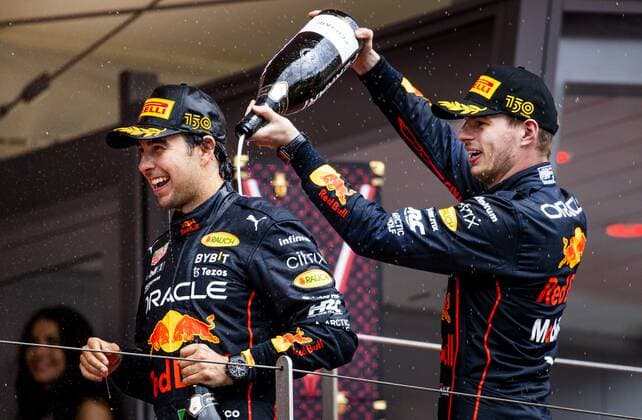 MONTE CARLO Sergio Perez Red Bull Racing and Max Verstappen Red Bull Racing on the podium after the F1 Grand Prix of Monaco at Circuit de Monaco on May 29, 2022 in Monte Carlo, Monaco REMKO DE WAAL F1 Grand Prix of Monaco, RACE 2022 xVIxANPxSportx xxANPxIVx 449514110 originalFilename: 449514110.jpg