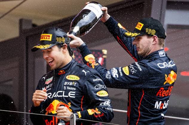 MONTE CARLO Sergio Perez Red Bull Racing and Max Verstappen Red Bull Racing on the podium after the F1 Grand Prix of Monaco at Circuit de Monaco on May 29, 2022 in Monte Carlo, Monaco REMKO DE WAAL F1 Grand Prix of Monaco, RACE 2022 xVIxANPxSportx xxANPxIVx 449514181 originalFilename: 449514181.jpg