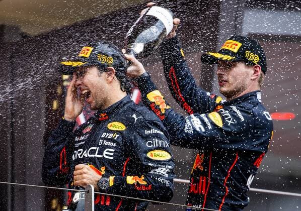 MONTE CARLO Sergio Perez Red Bull Racing and Max Verstappen Red Bull Racing on the podium after the F1 Grand Prix of Monaco at Circuit de Monaco on May 29, 2022 in Monte Carlo, Monaco REMKO DE WAAL F1 Grand Prix of Monaco, RACE 2022 xVIxANPxSportx xxANPxIVx 449514199 originalFilename: 449514199.jpg
