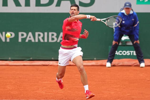 29th May 2022; Roland Garros, Paris, France: French Open Tennis tournament: Novak Djokovic (SRB) smashes a forehand return in his match against Diego Schwatrzman (ARG)  ActionPlus12394548 JonxBromley