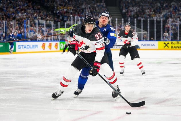 220529 Ryan Graves of Canada and Mikael Granlund of Finland during the 2022 IIHF Ice Hockey World Championship gold medal game between Finland and Canada on May 29, 2022 in Tampere Photo Maxim Thore BILDBYRAN kod MT MT0408 ishockey ice hockey ishockey vm iihf ice hockey world championship finland kanada canada bbeng,  Copyright: MAXIMxTHORE BB220529MT072