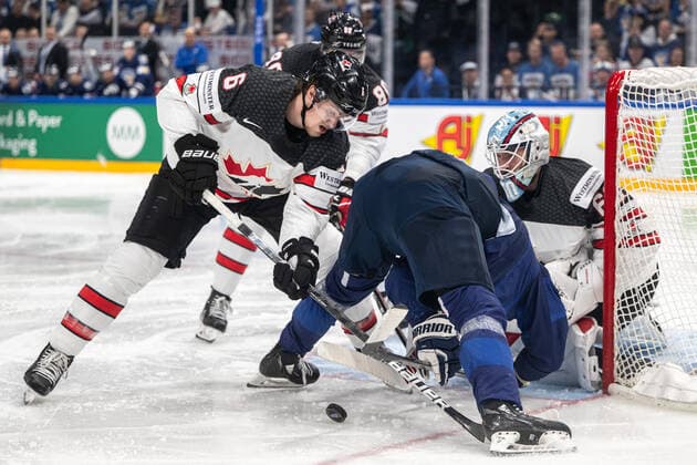 220529 Travis Sanheim of Canada and Hannes Björninen of Finland during the 2022 IIHF Ice Hockey World Championship gold medal game between Finland and Canada on May 29, 2022 in Tampere Photo Maxim Thore BILDBYRAN kod MT MT0408 ishockey ice hockey ishockey vm iihf ice hockey world championship finland kanada canada bbeng,  Copyright: MAXIMxTHORE BB220529MT101