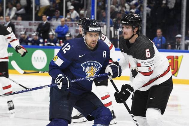 Eishockey, WM Finale, Finnland - Kanada Marko Anttila (12) of Finland and Travis Sanheim (6) of Canada during the 2022 IIHF Ice hockey, Eishockey World Championships final match between Finland and Canada in Tampere, on May 29th, 2022. Tampere Finland LKFTJK20220529210550ARMQ  Copyright: xJussixNukarix