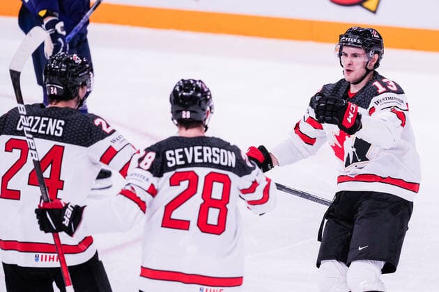 TAMPERE, FINLAND MAY 29 Dylan Cozens of Canada L celebrates his goal with Damon Severson of Canada M and Matt Barzal of Canada R during the 2022 IIHF Ice Hockey World Championship match between Finland and Canada at Nokia Arena on May 29, 2022 in Tampere, Finland Tampere Nokia Arena Finland  Copyright: xJustPictures.ch JarixPestelaccix