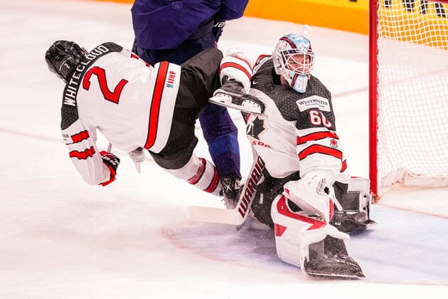 TAMPERE, FINLAND MAY 29 Zach Whitecloud of Canada L collides with goalkeeper Chris Driedger of Canada R during the 2022 IIHF Ice Hockey World Championship match between Finland and Canada at Nokia Arena on May 29, 2022 in Tampere, Finland Tampere Nokia Arena Finland  Copyright: xJustPictures.ch JarixPestelaccix