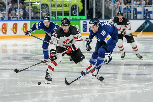 29 05 2022, Tampere, Nokia Arena, Finland v Canada 2022 IIHF Ice Hockey World Championship, 24 Dylan Cozens Canada against 12 Marko Anttila Finland Tampere Nokia Arena Pirkanmaa Finland  Copyright: xJustPictures.ch AndreaxBrancax