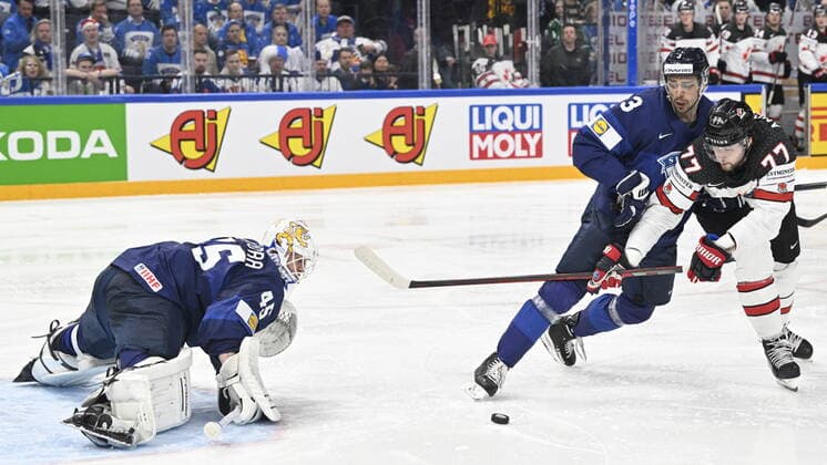 From left goalie of Finland Jussi Olkinuora, Niklas Friman of Finland, Josh Anderson of Canada in action during the 2022 IIHF Ice hockey, Eishockey World Championship, WM, Weltmeisterschaft gold medal match between Canada and Finland, Tampere, Finland, May 29, 2022. (CTKxPhoto MichalxKamaryt) CTKPhotoP2022052906231 
