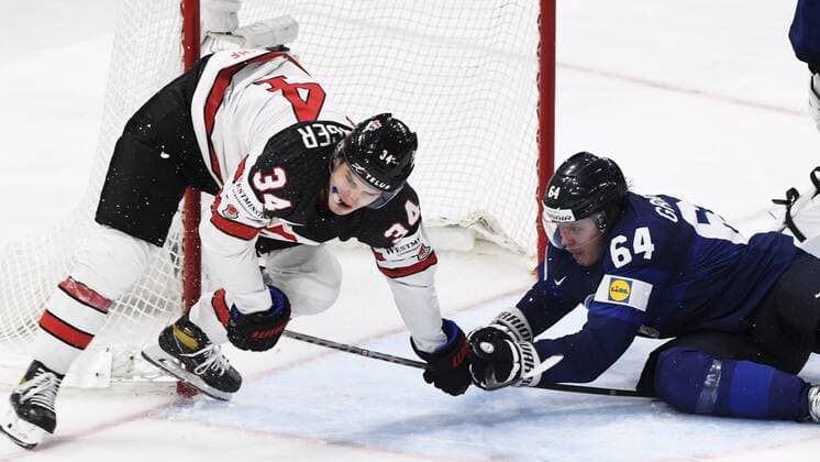 Cole Sillinger (34) of Canada and Mikael Granlund (64) of Finland during the 2022 IIHF Ice hockey, Eishockey World Championships final match between Finland and Canada in Tampere, on May 29th, 2022. Tampere Finland LKFTJK20220529221640MPZS  Copyright: xJussixNukarix