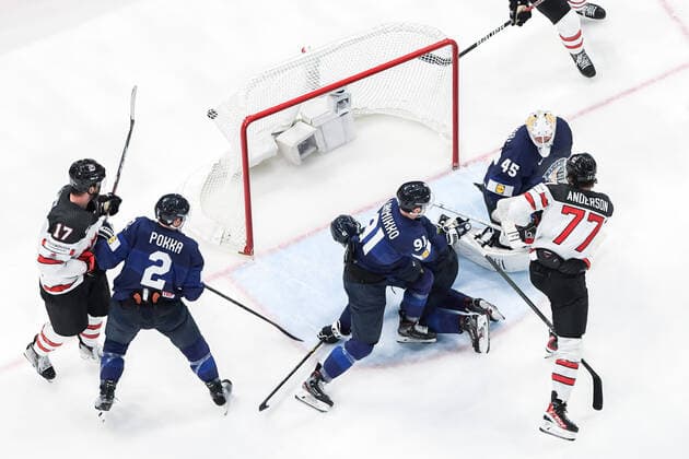 220529 Zach Whitecloud of Canada not in frame scores 3 2 behind goaltender Juho Olkinuora of Finland during the 2022 IIHF Ice Hockey World Championship gold medal game between Finland and Canada on May 29, 2022 in Tampere Photo Maxim Thore BILDBYRAN kod MT MT0408 ishockey ice hockey ishockey vm iihf ice hockey world championship finland kanada canada bbeng,  Copyright: MAXIMxTHORE BB220529MT133