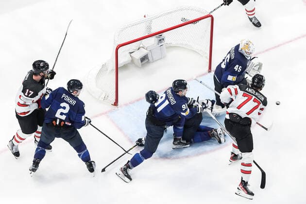 220529 Zach Whitecloud of Canada not in frame scores 3 2 behind goaltender Juho Olkinuora of Finland during the 2022 IIHF Ice Hockey World Championship gold medal game between Finland and Canada on May 29, 2022 in Tampere Photo Maxim Thore BILDBYRAN kod MT MT0408 ishockey ice hockey ishockey vm iihf ice hockey world championship finland kanada canada bbeng,  Copyright: MAXIMxTHORE BB220529MT134