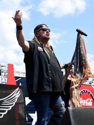 CHARLOTTE, NC - MAY 29: Johnny Van Zant, lead singer for Lynyrd Skynyrd performs during the pre-race activities before the running of the NASCAR, Motorsport, USA Cup Series Coca-Cola 600 on May 29, 2022, at Charlotte Motor Speedway in Concord, NC.(Photo by Jeffrey Vest Icon Sportswire) AUTO: MAY 29 NASCAR Cup Series Coca-Cola 600 Icon220529013
