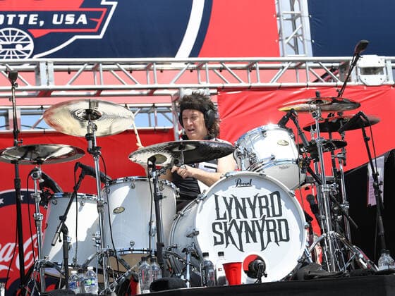 CHARLOTTE, NC - MAY 29: Michael Cartonelle, drummer for the band Lynyrd Skynyrd performs during the pre-race activities before the running of the NASCAR, Motorsport, USA Cup Series Coca-Cola 600 on May 29, 2022, at Charlotte Motor Speedway in Concord, NC.(Photo by Jeffrey Vest Icon Sportswire) AUTO: MAY 29 NASCAR Cup Series Coca-Cola 600 Icon220529046