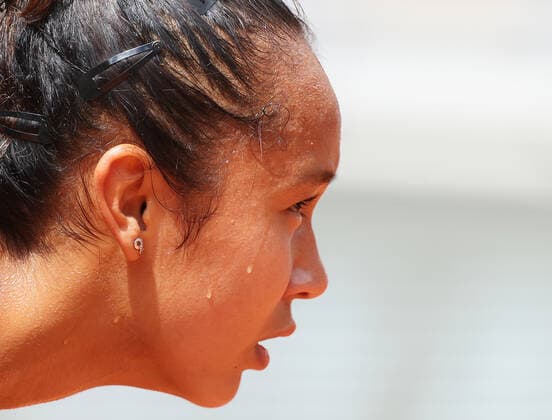 (220531) -- PARIS, May 31, 2022 -- Leylah Fernandez of Canada reacts during the women s singles quarterfinal against Martina Trevisan of Italy at the French Open tennis tournament at Roland Garros in Paris, France, May 31, 2022. ) (SP)FRANCE-PARIS-TENNIS-ROLAND GARROS-FRENCH OPEN-WOMEN S SINGLES QUARTERFINAL GaoxJing 