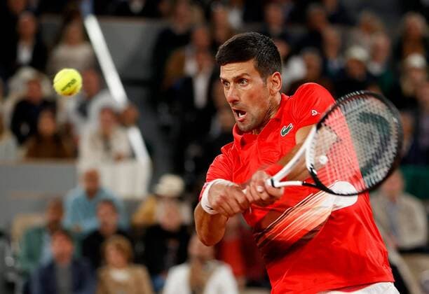 Mandatory Credit: Photo by Ella Ling Shutterstock (12959947et) Novak Djokovic of Serbia in action French Open Tennis, Day 10, Roland Garros, Paris, France - 31 May 2022 French Open Tennis, Day 10, Roland Garros, Paris, France - 31 May 2022  Copyright: xEllaxLing Shutterstockx 12959947et