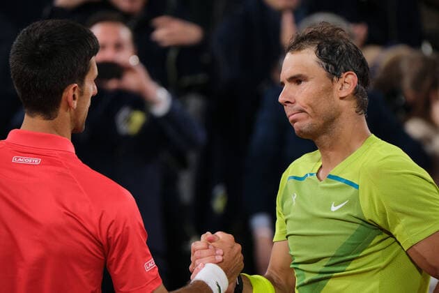 (220601) -- PARIS, June 1, 2022 -- Serbia s Novak Djokovic greets Spain s Rafael Nadal (R) after their men s singles quarterfinal at the French Open tennis tournament at Roland Garros in Paris, France, June 1, 2022. ) (SP)FRANCE-PARIS-TENNIS-ROLAND GARROS-FRENCH OPEN-MEN S SINGLES QUARTERFINAL MengxDingbo 