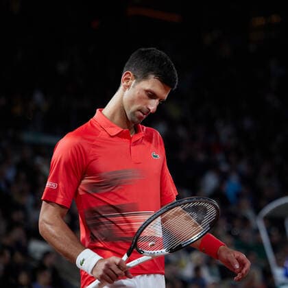 (220601) -- PARIS, June 1, 2022 -- Novak Djokovic reacts during the men s singles quarterfinal between Serbia s Novak Djokovic and Spain s Rafael Nadal at the French Open tennis tournament at Roland Garros in Paris, France, June 1, 2022. ) (SP)FRANCE-PARIS-TENNIS-ROLAND GARROS-FRENCH OPEN-MEN S SINGLES QUARTERFINAL MengxDingbo 