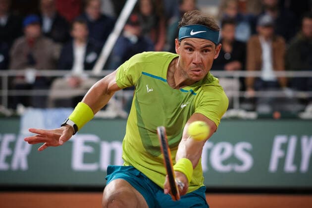 (220601) -- PARIS, June 1, 2022 -- Rafael Nadal returns a shot during the men s singles quarterfinal between Serbia s Novak Djokovic and Spain s Rafael Nadal at the French Open tennis tournament at Roland Garros in Paris, France, June 1, 2022. ) (SP)FRANCE-PARIS-TENNIS-ROLAND GARROS-FRENCH OPEN-MEN S SINGLES QUARTERFINAL MengxDingbo 
