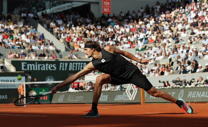 (220601) -- PARIS, June 1, 2022 -- Alexander Zverev returns the ball during the men s singles quarterfinal between Germany s Alexander Zverev and Spain s Carlos Alcaraz at the French Open tennis tournament at Roland Garros in Paris, France, May 31, 2022. ) (SP)FRANCE-PARIS-TENNIS-ROLAND GARROS-FRENCH OPEN-MEN S SINGLES QUARTERFINAL GaoxJing 