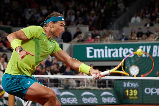 (220601) -- PARIS, June 1, 2022 -- Rafael Nadal returns a shot during the men s singles quarterfinal between Serbia s Novak Djokovic and Spain s Rafael Nadal at the French Open tennis tournament at Roland Garros in Paris, France, June 1, 2022. ) (SP)FRANCE-PARIS-TENNIS-ROLAND GARROS-FRENCH OPEN-MEN S SINGLES QUARTERFINAL MengxDingbo 