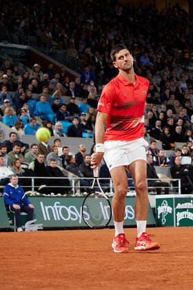 (220601) -- PARIS, June 1, 2022 -- Novak Djokovic reacts during the men s singles quarterfinal between Serbia s Novak Djokovic and Spain s Rafael Nadal at the French Open tennis tournament at Roland Garros in Paris, France, June 1, 2022. ) (SP)FRANCE-PARIS-TENNIS-ROLAND GARROS-FRENCH OPEN-MEN S SINGLES QUARTERFINAL MengxDingbo 