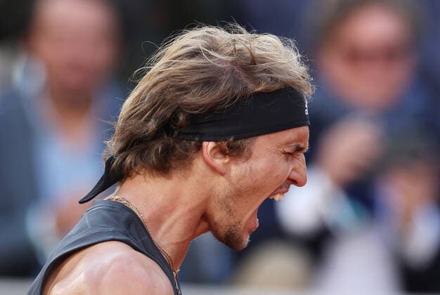 (220601) -- PARIS, June 1, 2022 -- Alexander Zverev celebrates his victory after the men s singles quarterfinal between Germany s Alexander Zverev and Spain s Carlos Alcaraz at the French Open tennis tournament at Roland Garros in Paris, France, May 31, 2022. ) (SP)FRANCE-PARIS-TENNIS-ROLAND GARROS-FRENCH OPEN-MEN S SINGLES QUARTERFINAL GaoxJing 